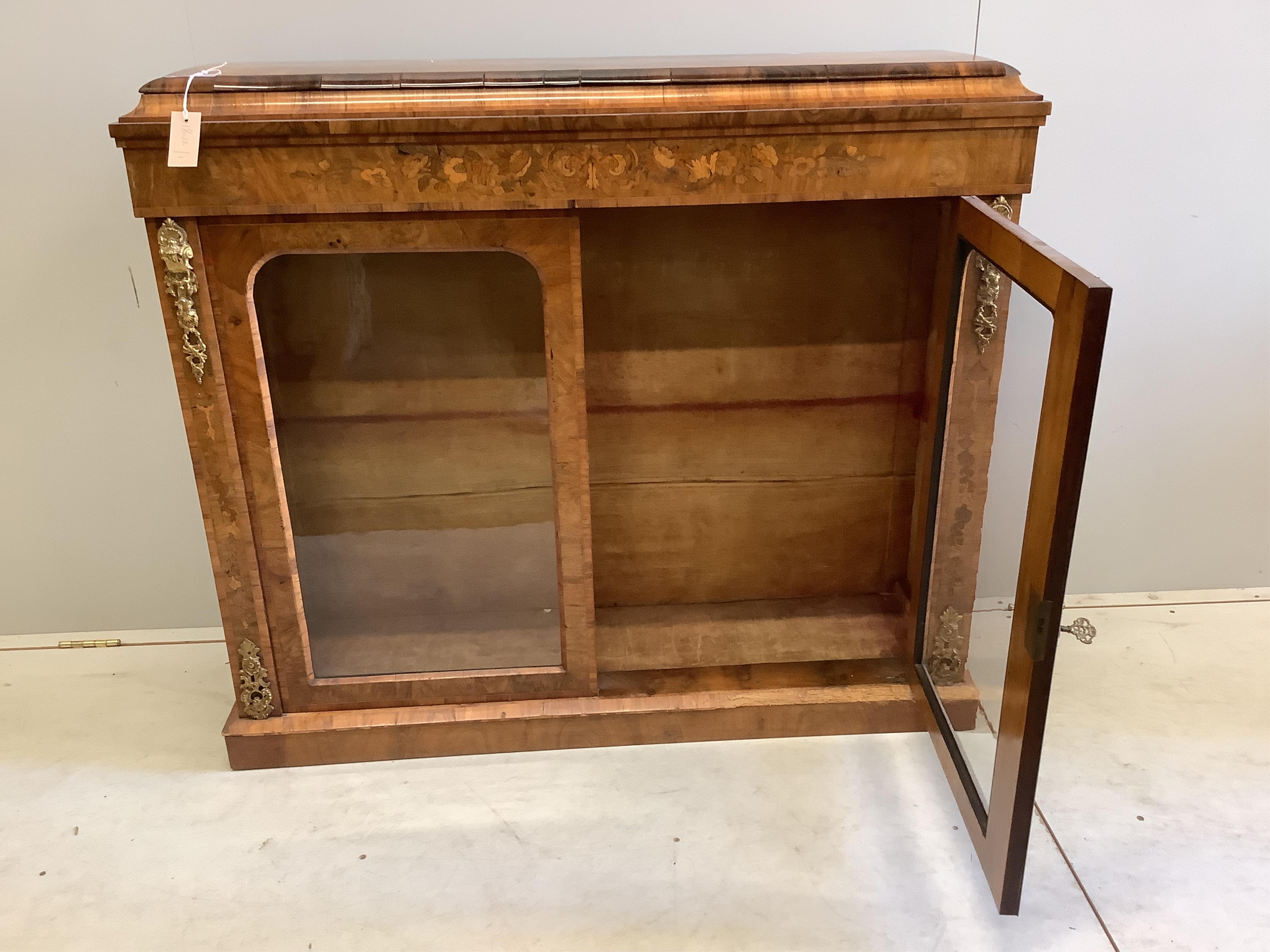A Victorian gilt metal mounted marquetry inlaid walnut side cabinet, width 117cm, depth 33cm, height 101cm. Condition - fair to good